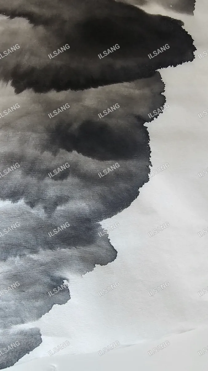 A black and white drawing of a cloudy sky.