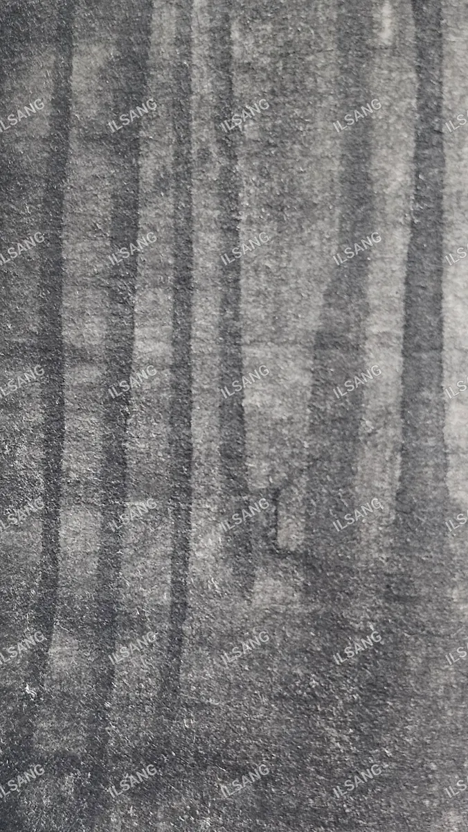 A black and white photo of a tree with a gray background.