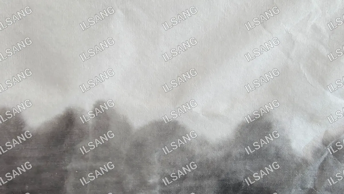 A black and white photo of a tree with the word isang on it.