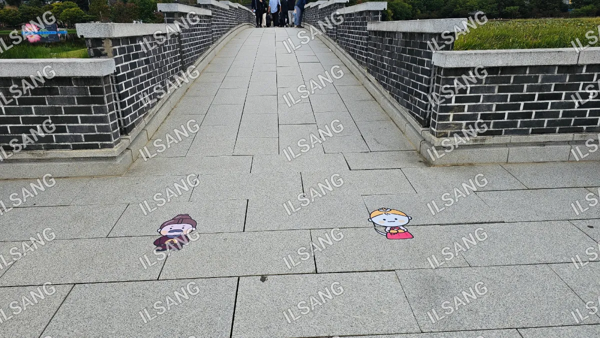 A bridge with a cartoon character on it.