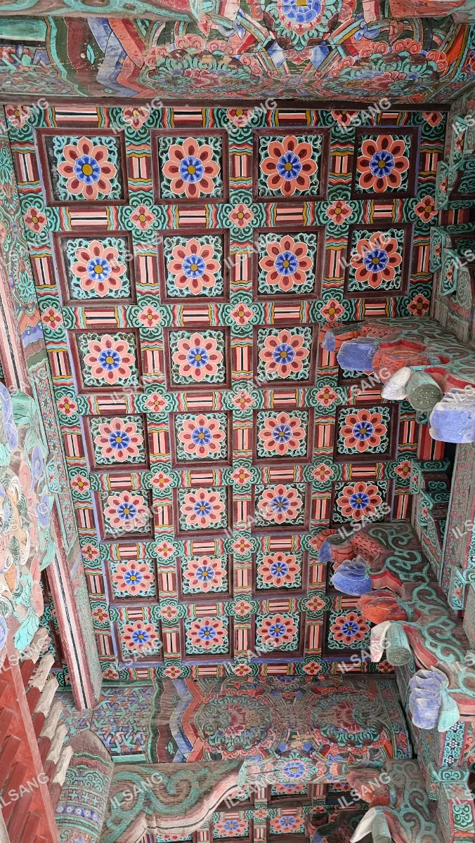 A colorful mosaic design on a wall.