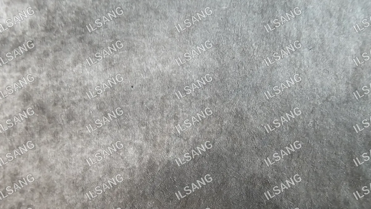 A gray material with the word isang on it.