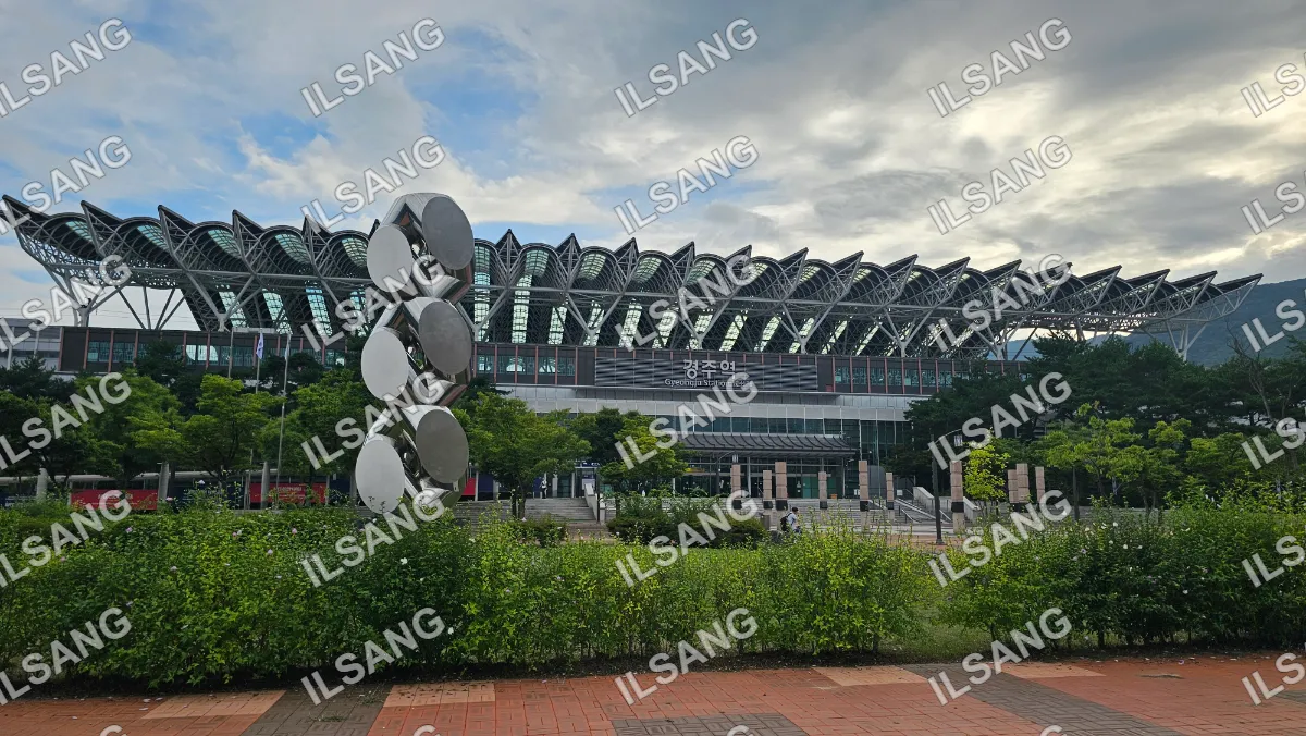 A large building with a satellite dish on the roof.