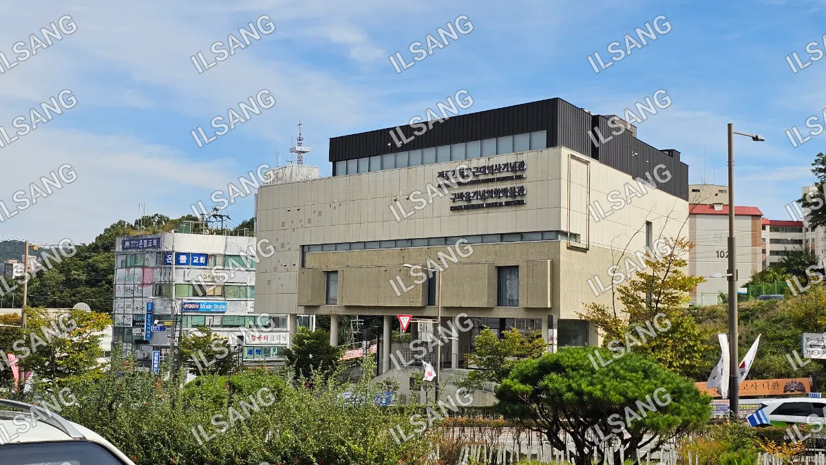 A large building with a sign on the front.
