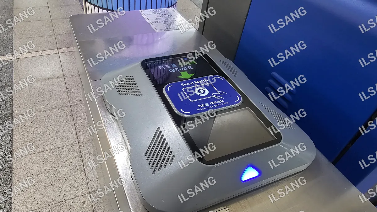 A machine with a blue button on it.