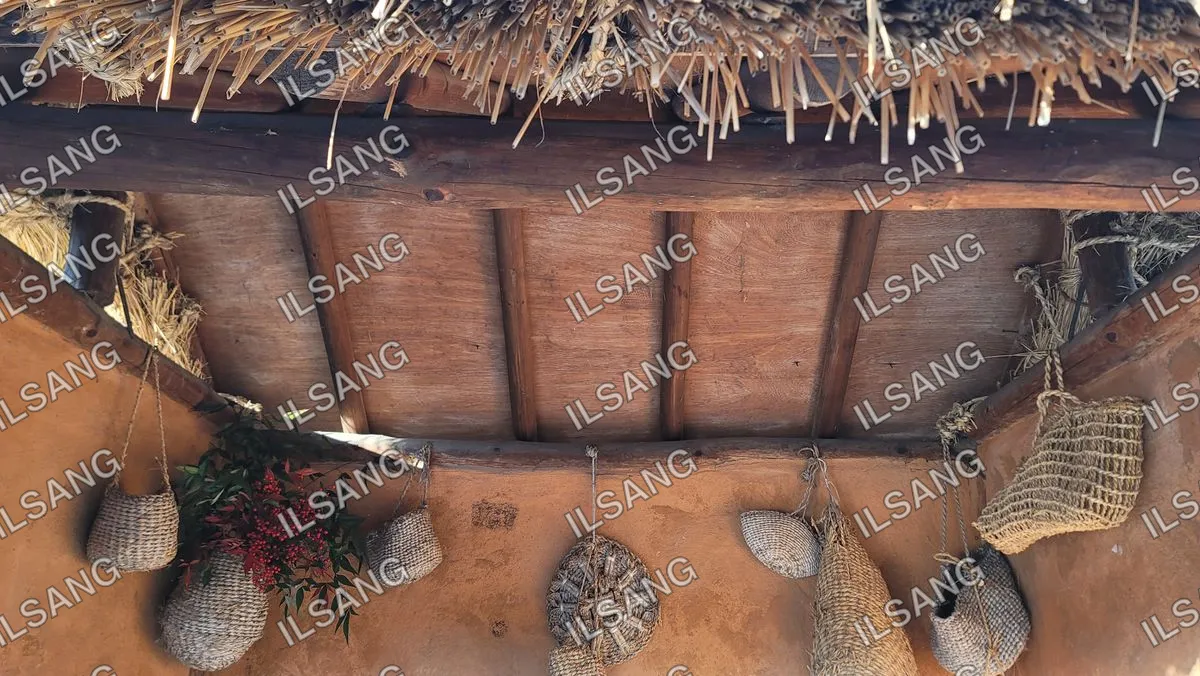 A wall with a wooden structure and a hanging basket.