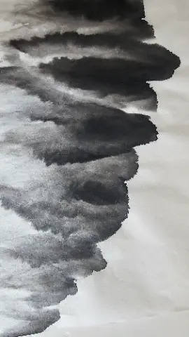 A black and white drawing of a cloud