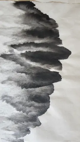 A black and white drawing of a cloud