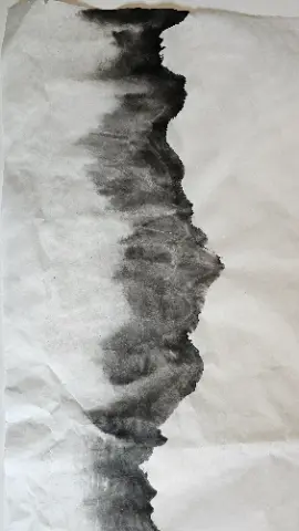A black and white image of a mountain