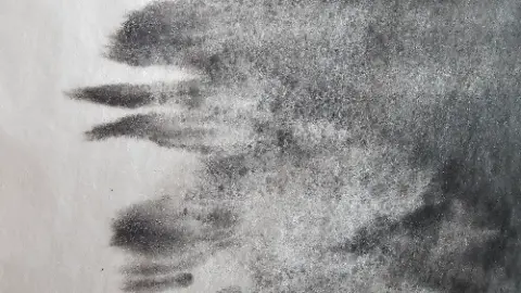 A black and white photo of a dirty cloth