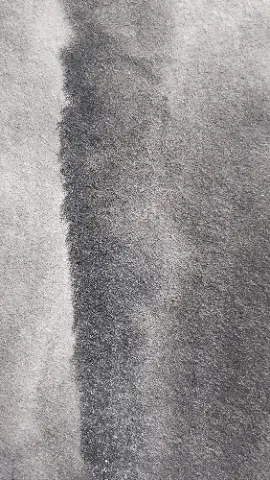 A black and white photo of a gray cloth with