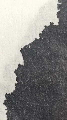 A black and white photo of a piece of paper