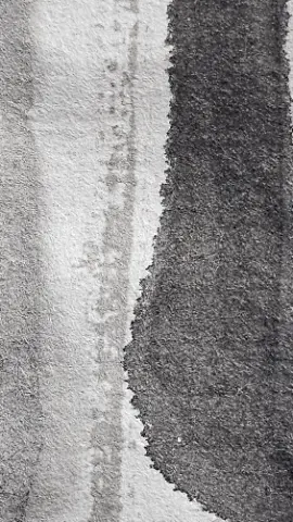 A black and white photo of a white cloth with