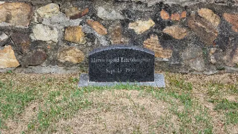 A black gravestone for Martie Ingvaldsdatter