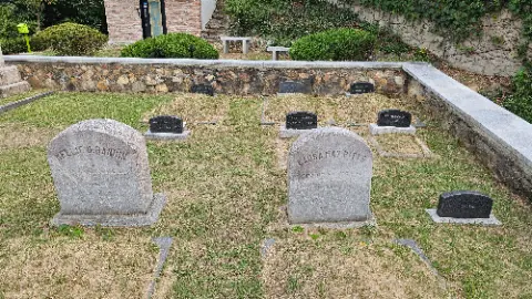A cemetery with a large number of graves