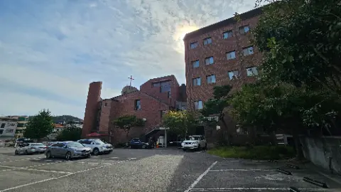 A church with a cross on top of it