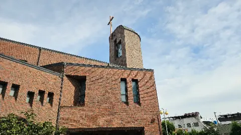 A church with a cross on top of it