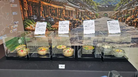 A display of food in glass cases