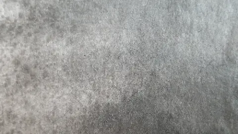 A gray material with the word isang on it