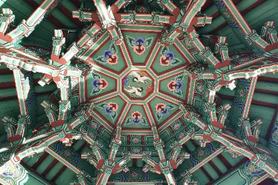 A green and red ceiling with a bird in the