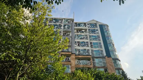 A large building with many windows and balconies