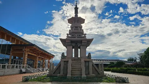 A large stone structure with a pagoda roof and a