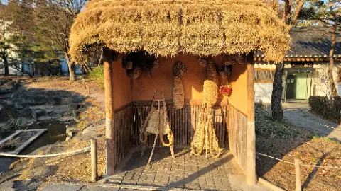 Traditional Korean thatched-roof cottage